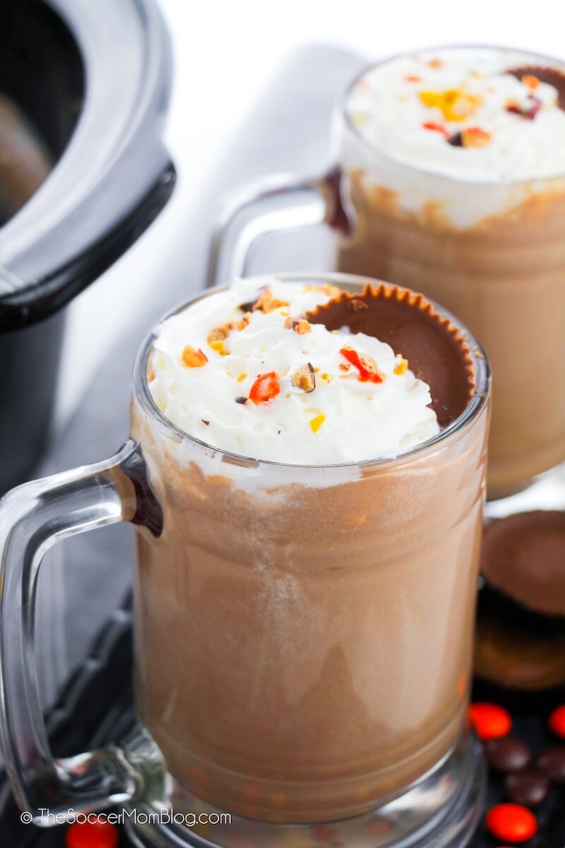 mug of creamy hot chocolate with peanut butter cups on top