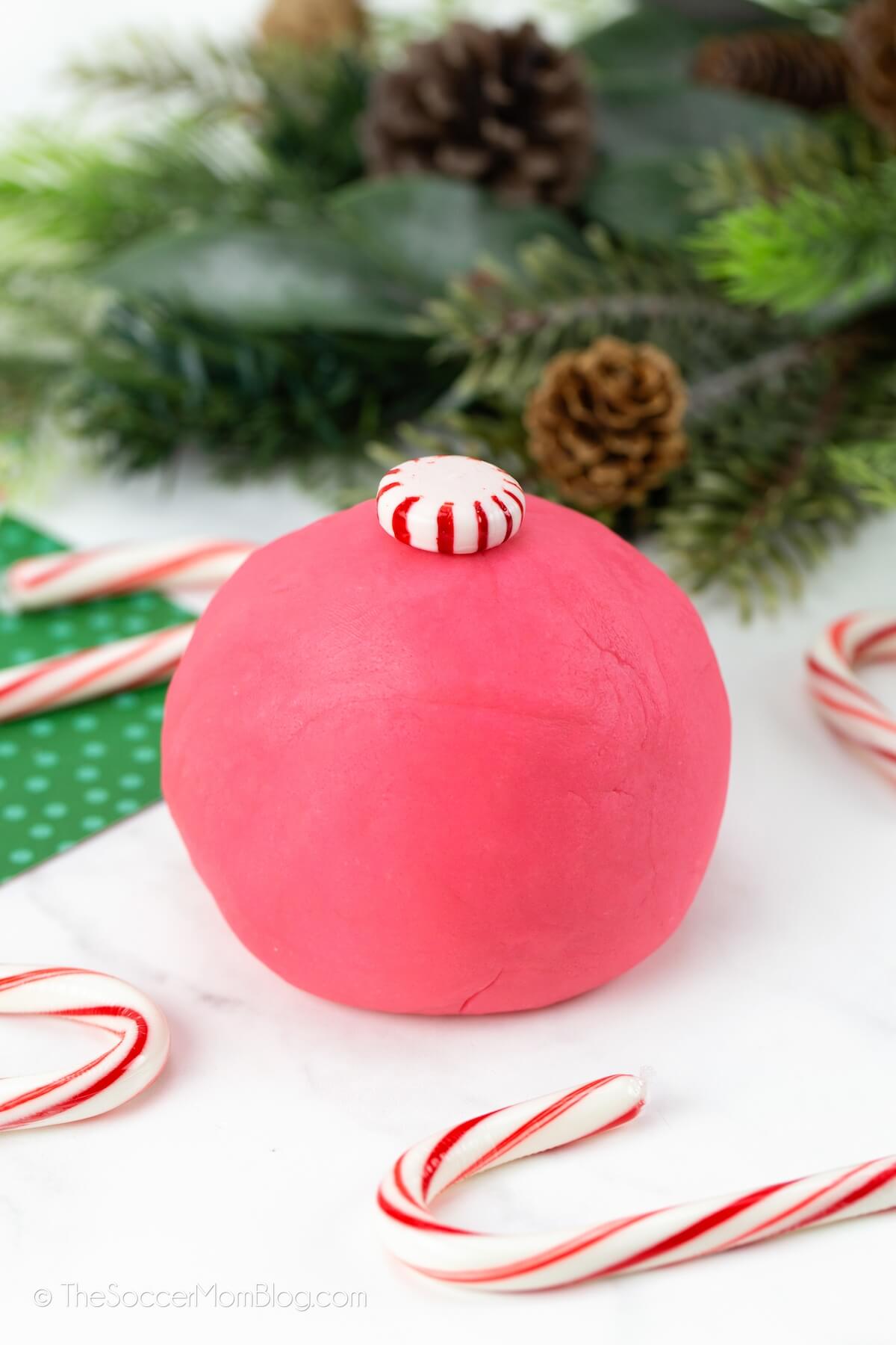 ball of peppermint playdough with mint on top