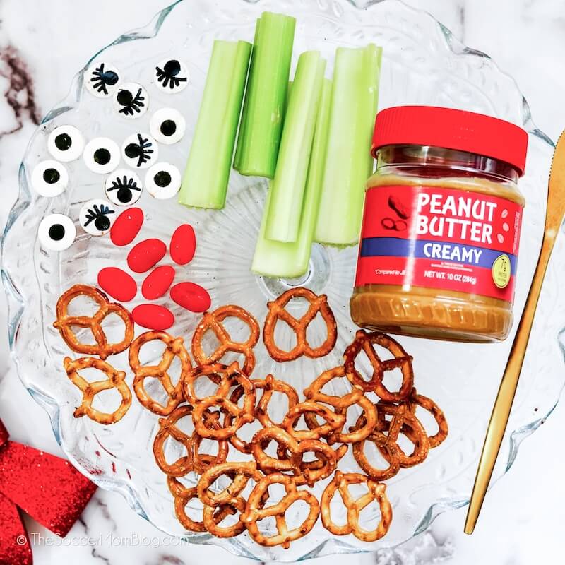 ingredients needed to play Reindeer celery - sliced celery, peanut butter, and pretzels