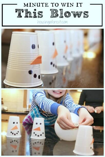 kids playing game with snowmen plastic cups