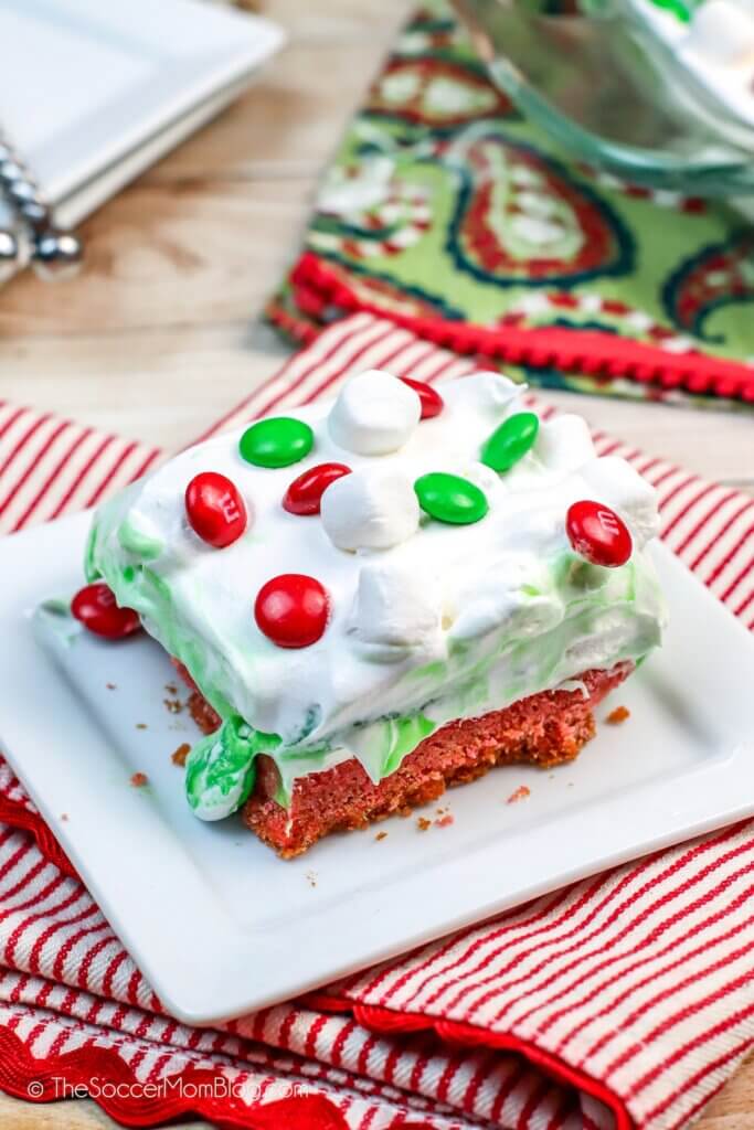 red white and green layered Christmas Lasagna on a white plate