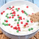 homemade Christmas cookie dip with sprinkles and graham crackers for dipping
