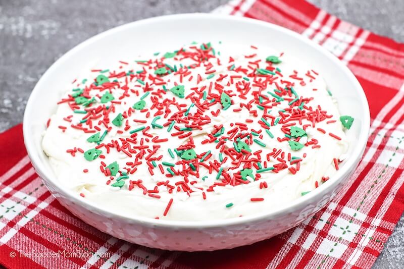 bowl of sugar cookie dip with Christmas sprinkles