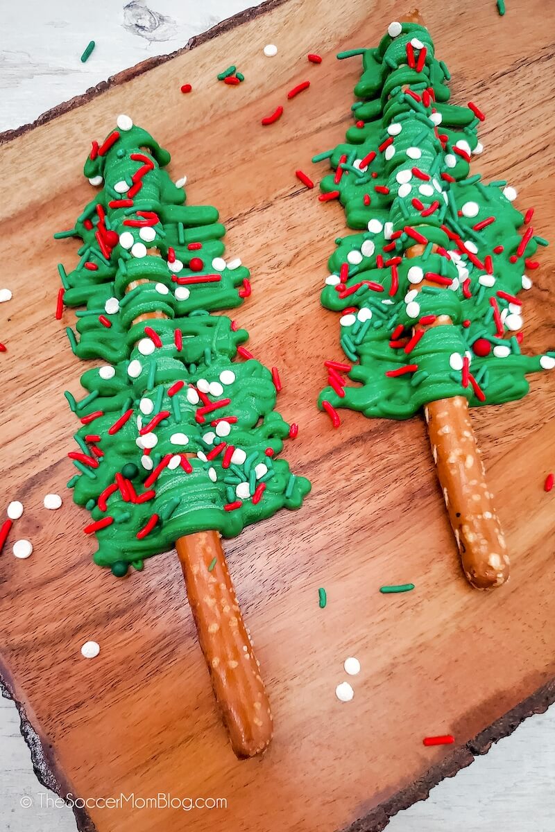 pretzel rods decorated to look like Christmas trees
