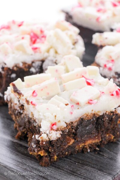 fudge brownies with white chocolate frosting and peppermint pieces