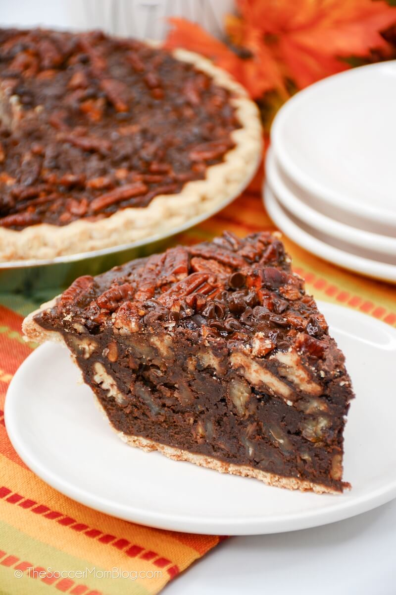 A slice of Texas Pecan Fudge Pie on a plate