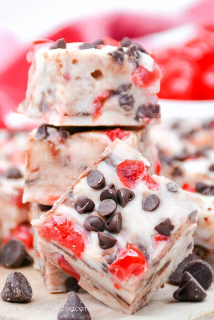 stack of white chocolate cherry fudge squares 