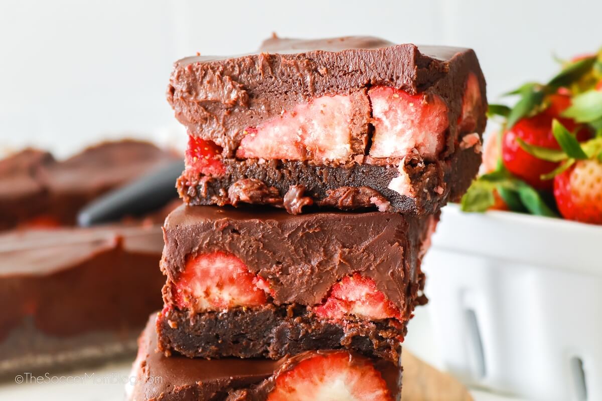 stack of chocolate covered strawberry brownies.