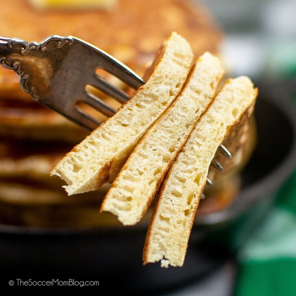 A bite of Sourdough Pancakes on a fork