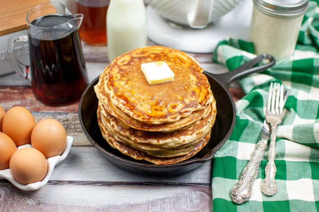 stack of pancakes on a country table setting