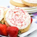 jam filled sugar cookie with cream cheese swirl icing