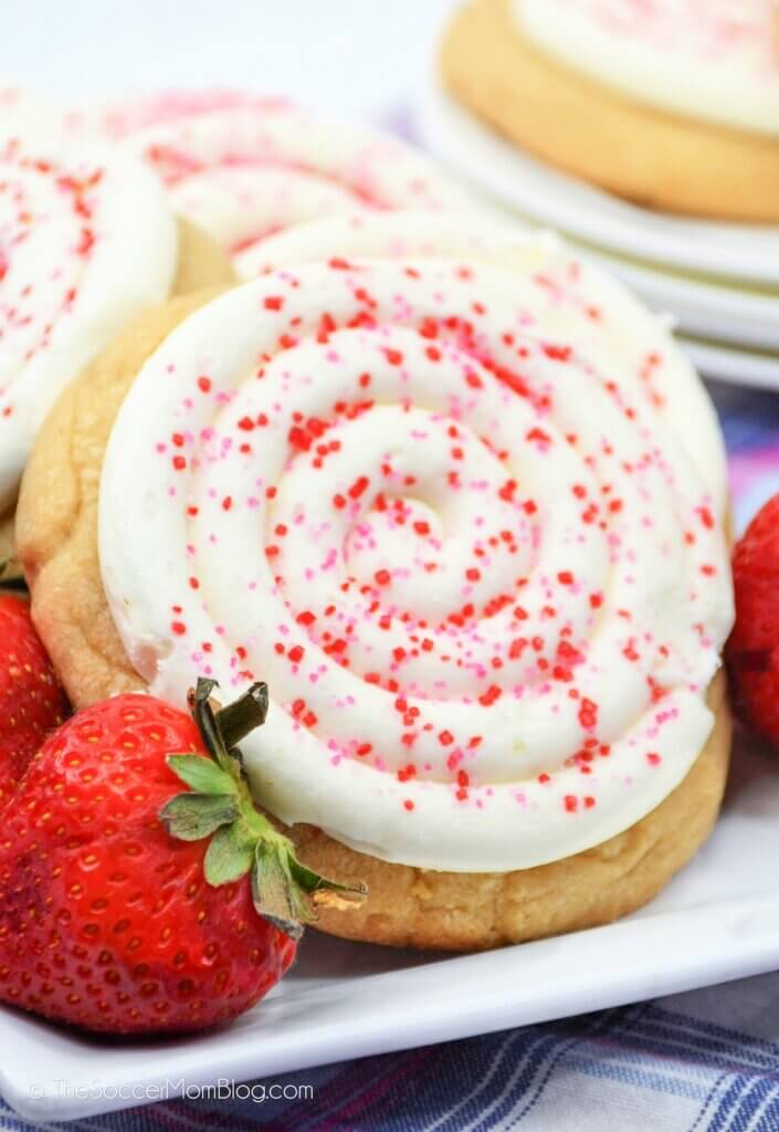 Close up of frosting swirl on a strawberry filled sugar cookie