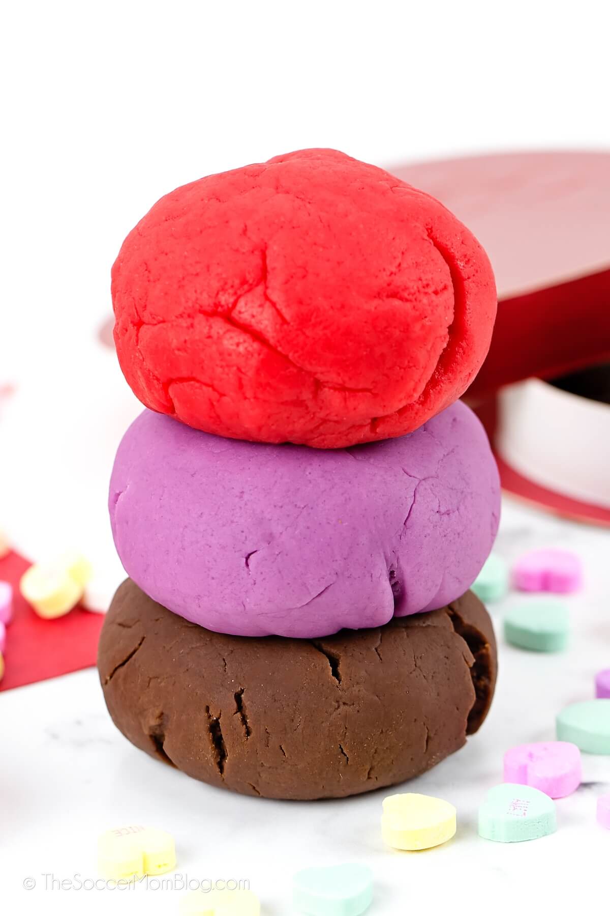 red, purple, and chocolate homemade play dough for Valentine's Day