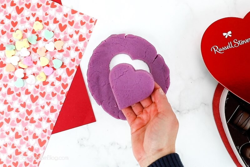 heart shaped cutout with purple playdough