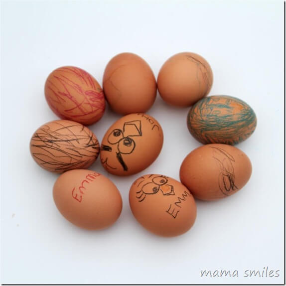 brown eggs with drawn-on decorations