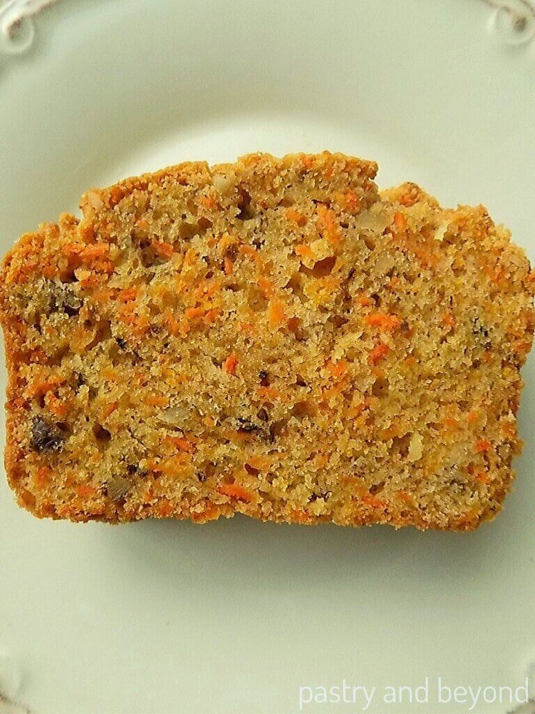 close up of slice of carrot loaf