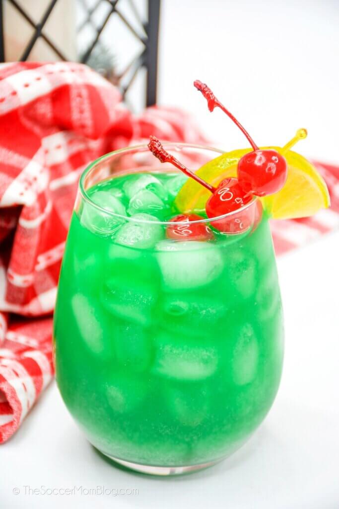 bright green "Welsh Dragon" cocktail, inspired by Disney Rose & Crown pub