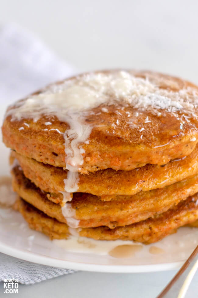 stack of keto carrot cake pancakes with melted butter on top