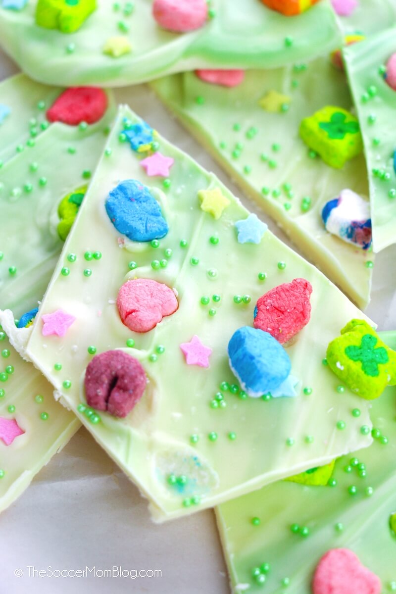 close up of a piece of green St. Patrick's Day candy bark with Lucky Charms marshmallows