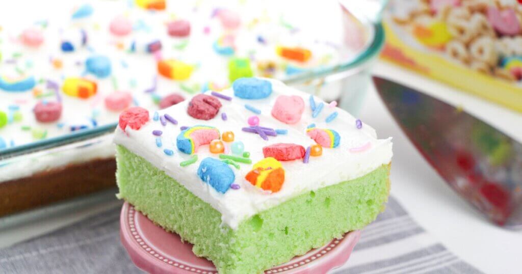 green sheet cake with Lucky Charms marshmallows in the frosting