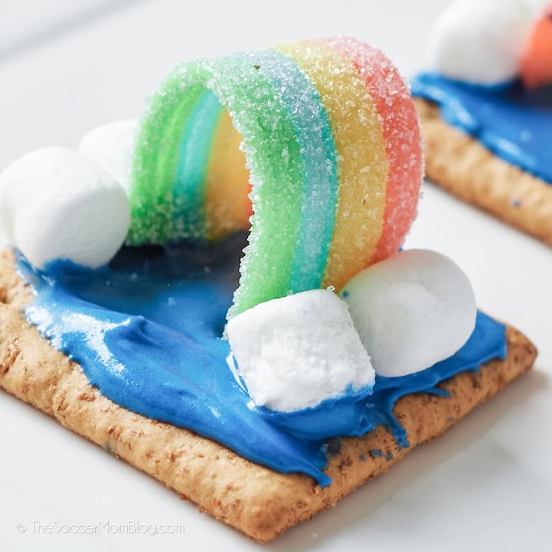 Close up view of Rainbow Graham Crackers, made with blue frosting and rainbow candy