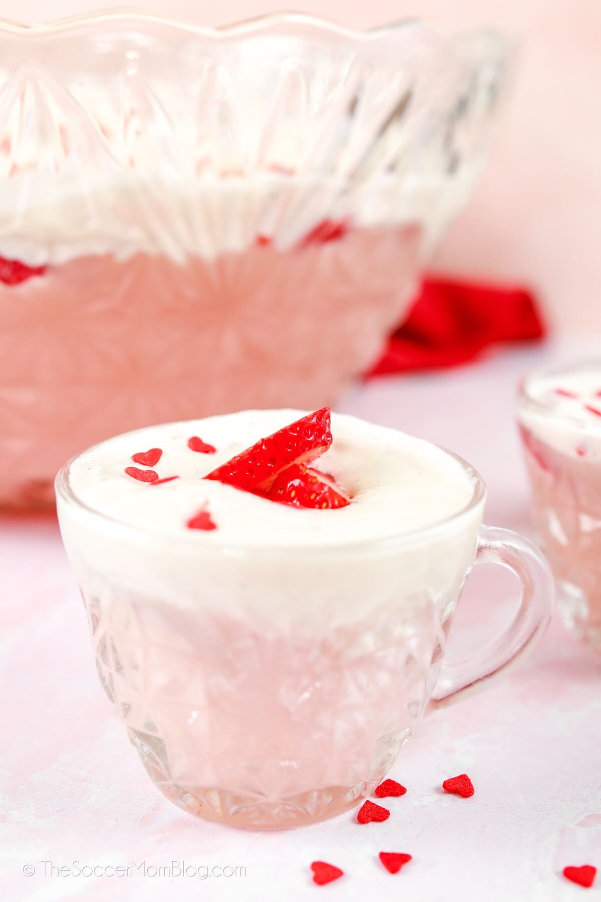 glass mug of strawberry Valentine's Day punch with heart sprinkles