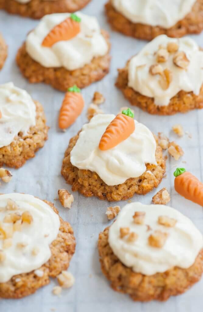 carrot cake cookies with carrot decorations on top
