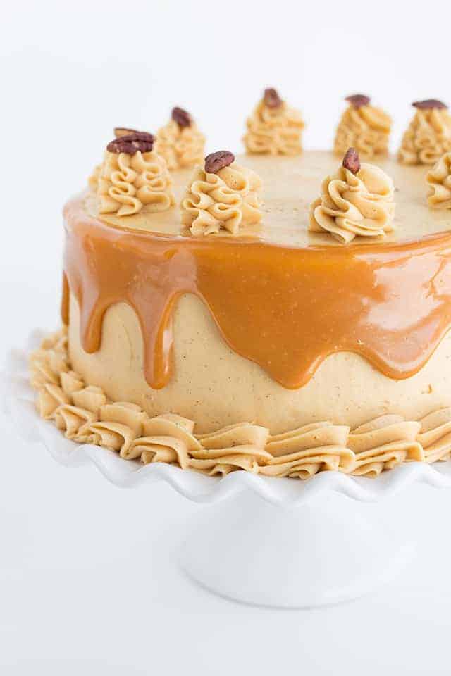 carrot cake with caramel frosting and caramel drizzle