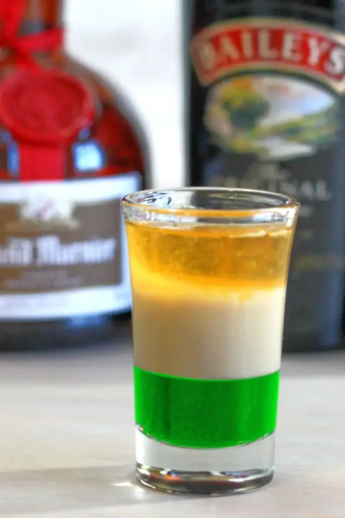 shooter recipe layered in colors of the Irish flag