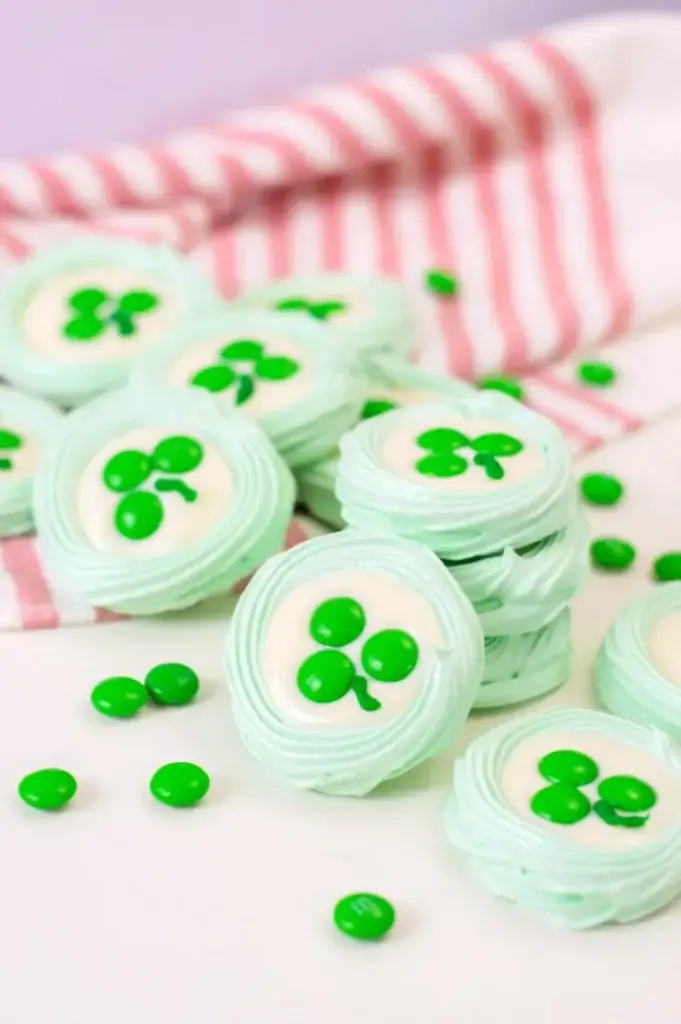 green meringues with shamrock decorations