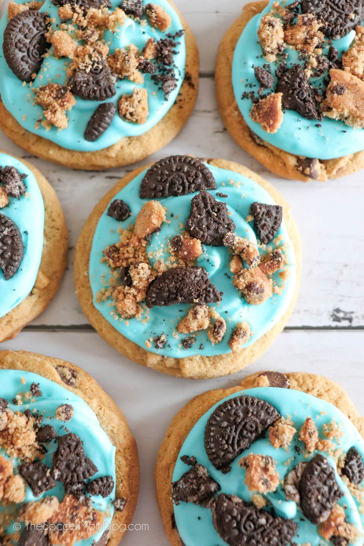 Cookie Monster Cookies with blue icing and cookie pieces on top