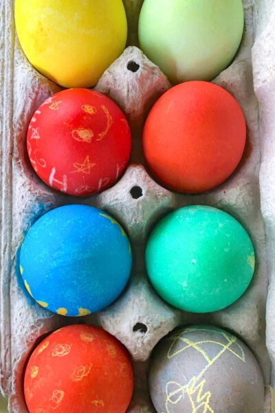 carton of brightly dyed Easter eggs