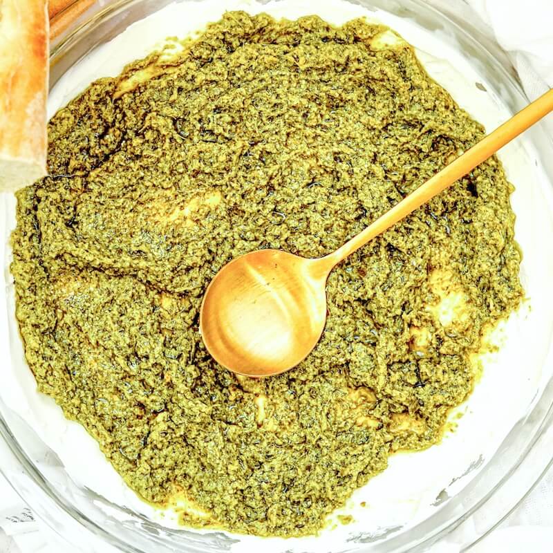 topping cheese dip with pesto sauce