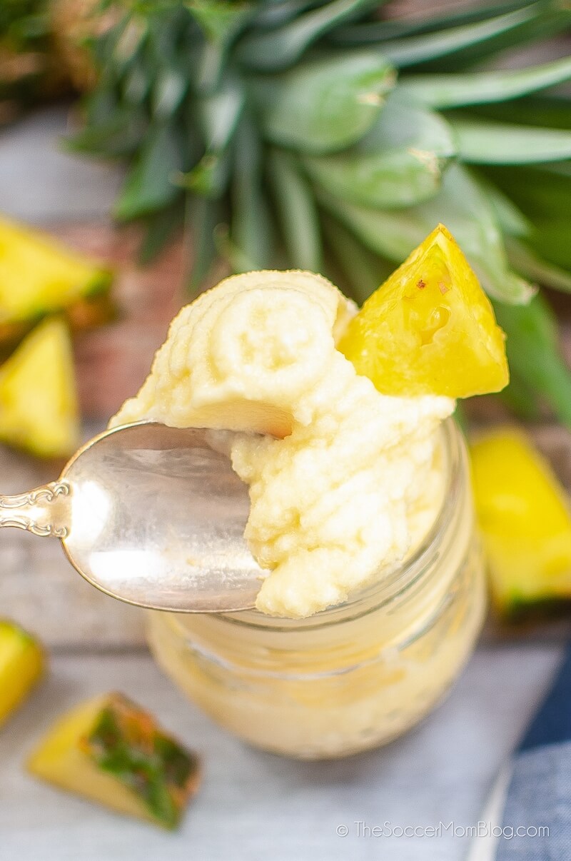 scooping up homemade pineapple soft serve ice cream