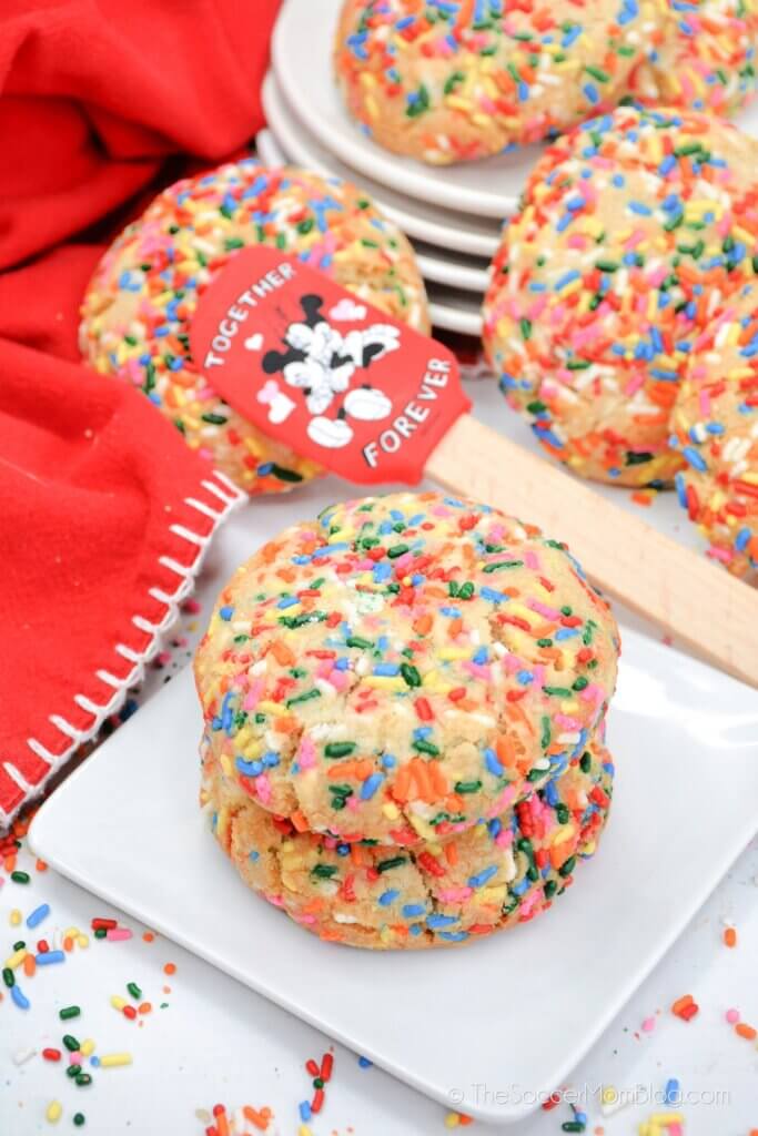 Funfetti Cookies on a white plate with Disney spatula