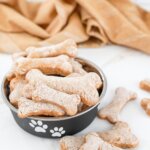 bowl of homemade dog biscuits shaped like bones
