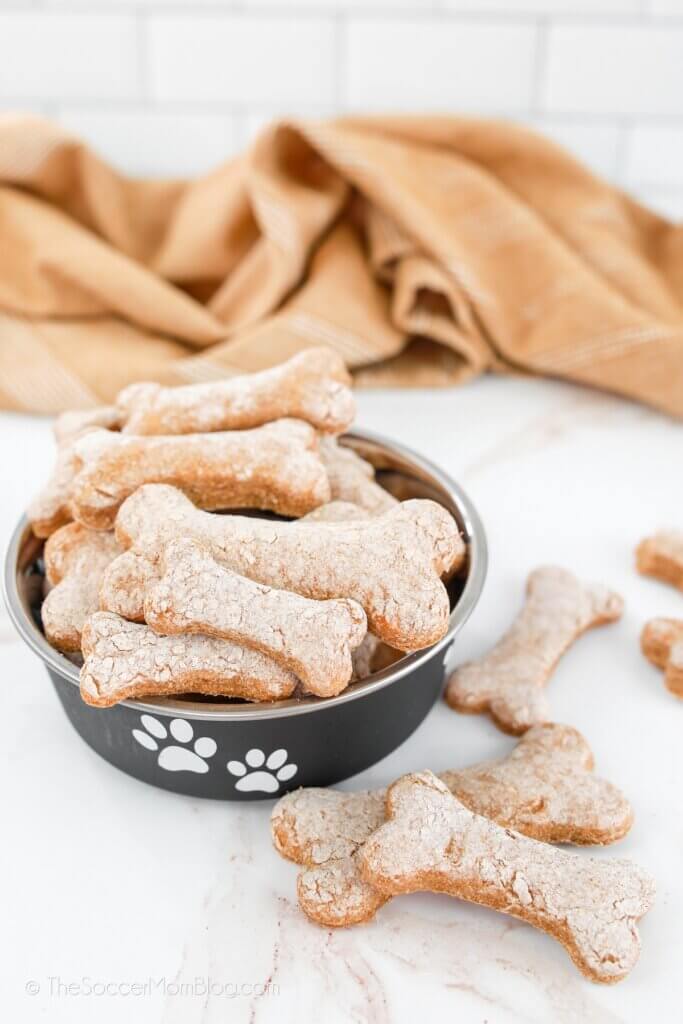 bowl of homemade dog biscuits shaped like bones