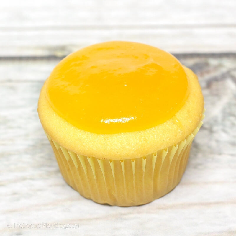 yellow cupcake topped with lemon curd