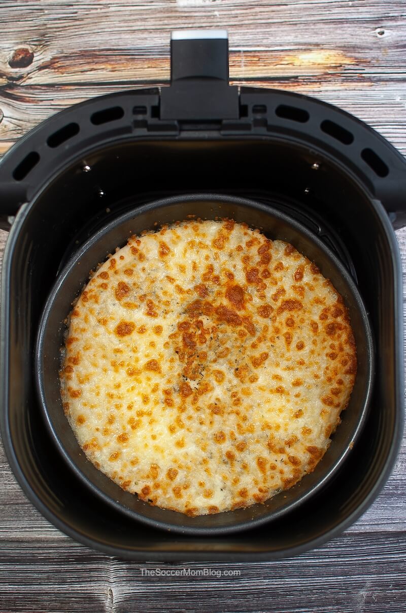 pizza dough in basket of air fryer