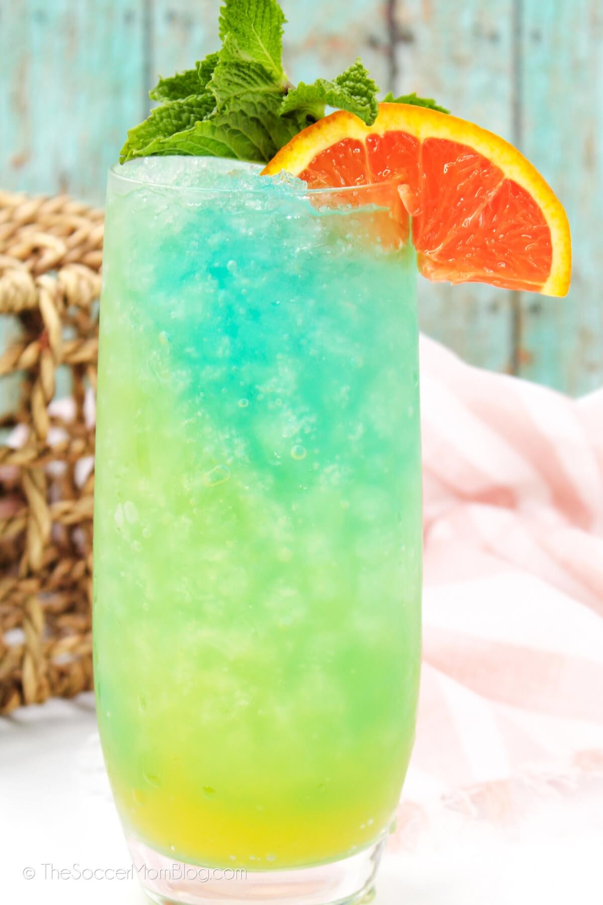 ombre yellow, green, and blue tropical cocktail