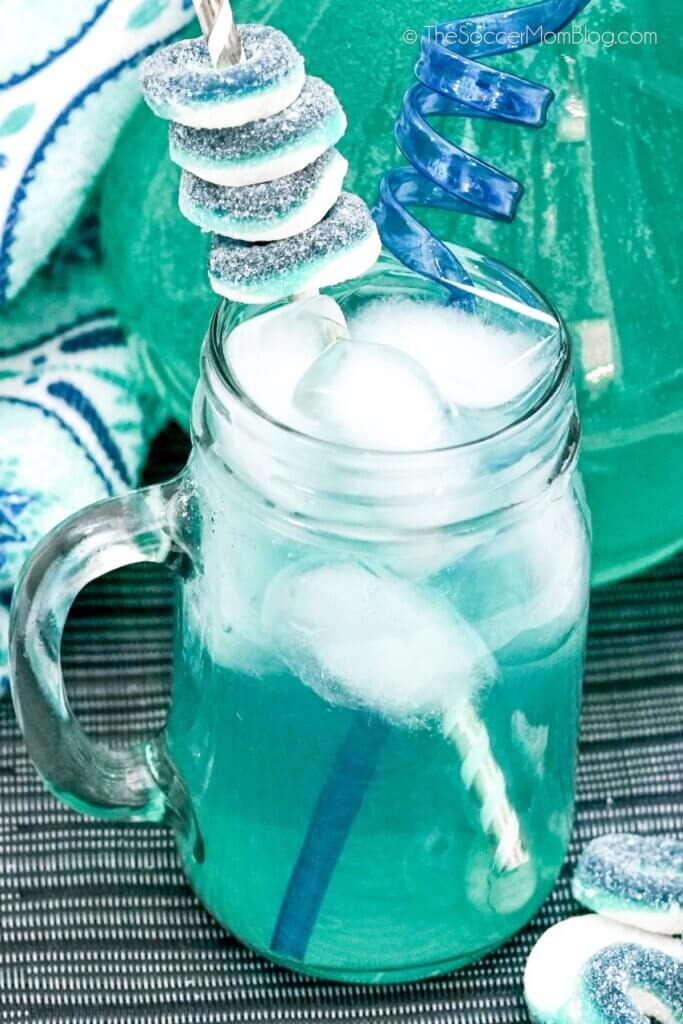 bright blue punch with blue decor in a mason jar