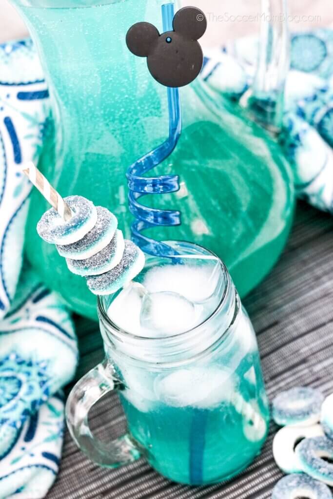 Cinderella Cooler Mocktail with blue decorations and Mickey straw