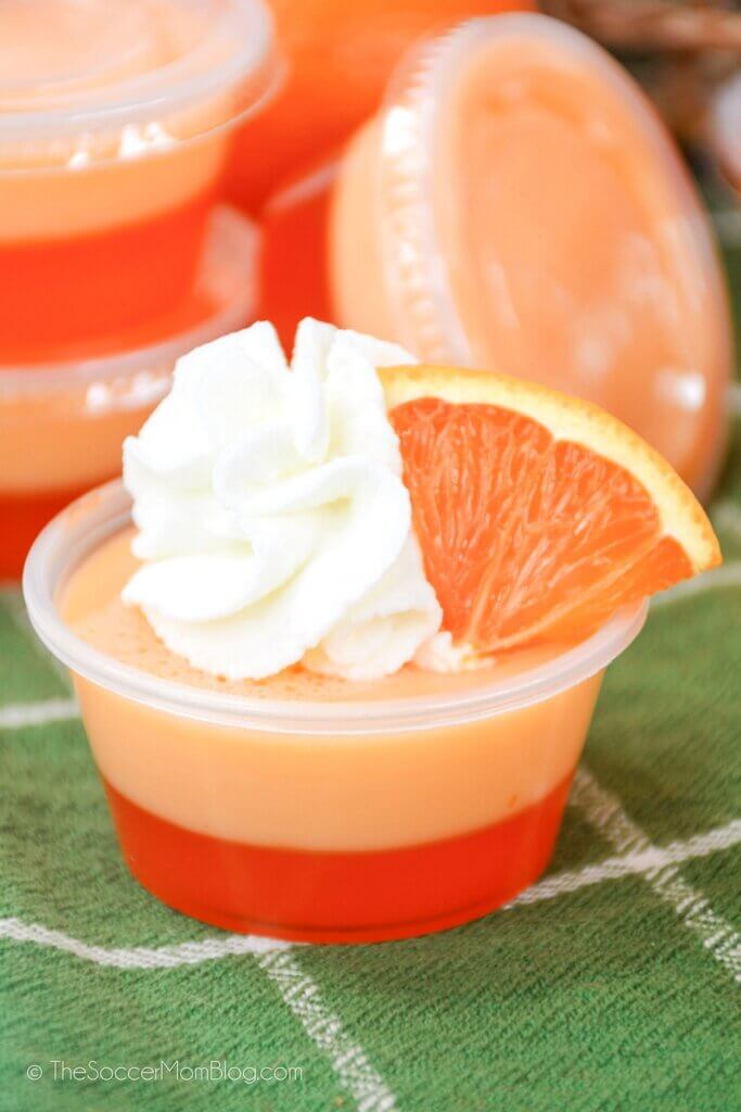 close up of a layered orange jello shot
