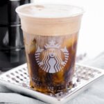 A Copycat Starbucks Chocolate Cold Brew Cup on a metal tray