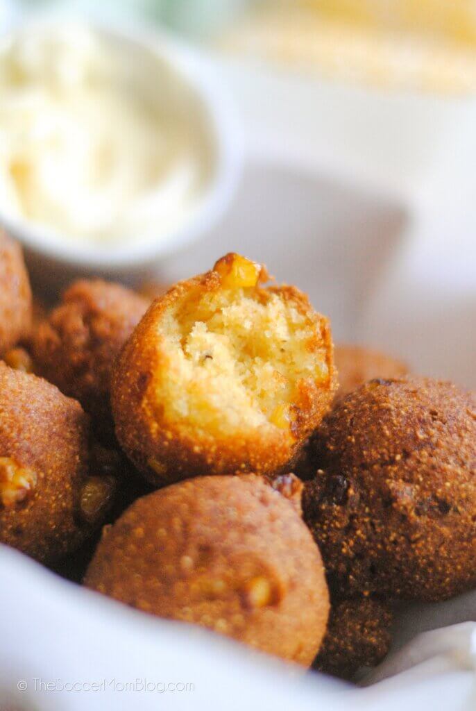 basket of hush puppies with side of honey butter
