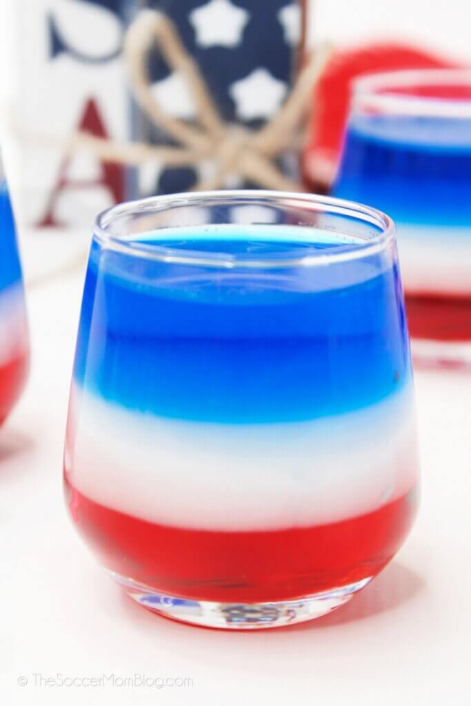 close up of a 4th of July layered drink