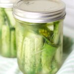 two pint jars of homemade dill pickles