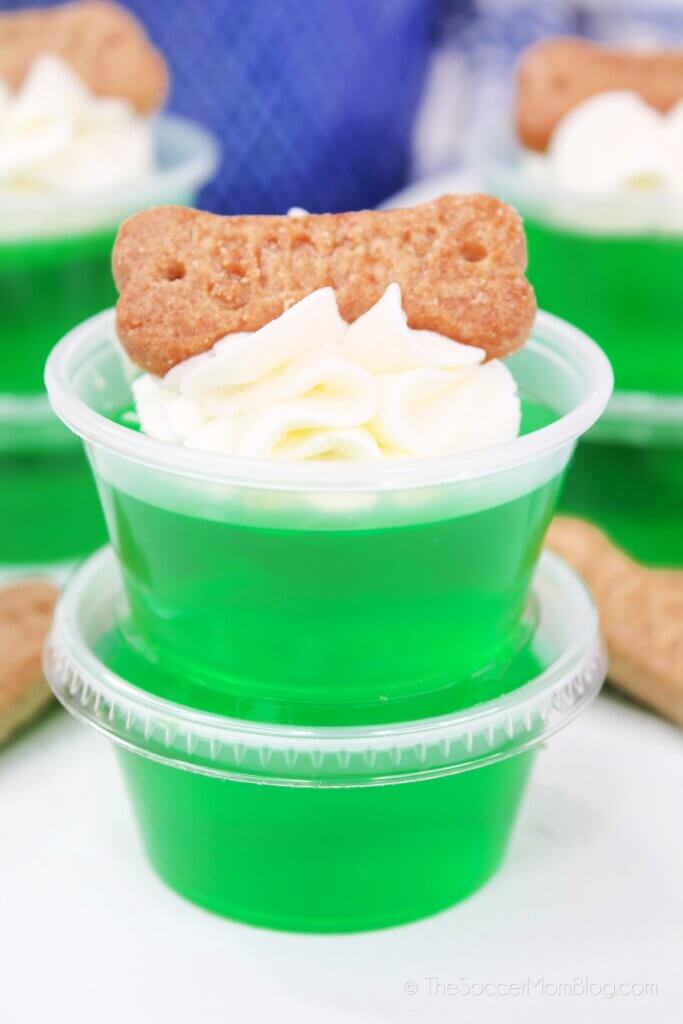 stack of lime green jello shots with Scooby Snack cookie on top