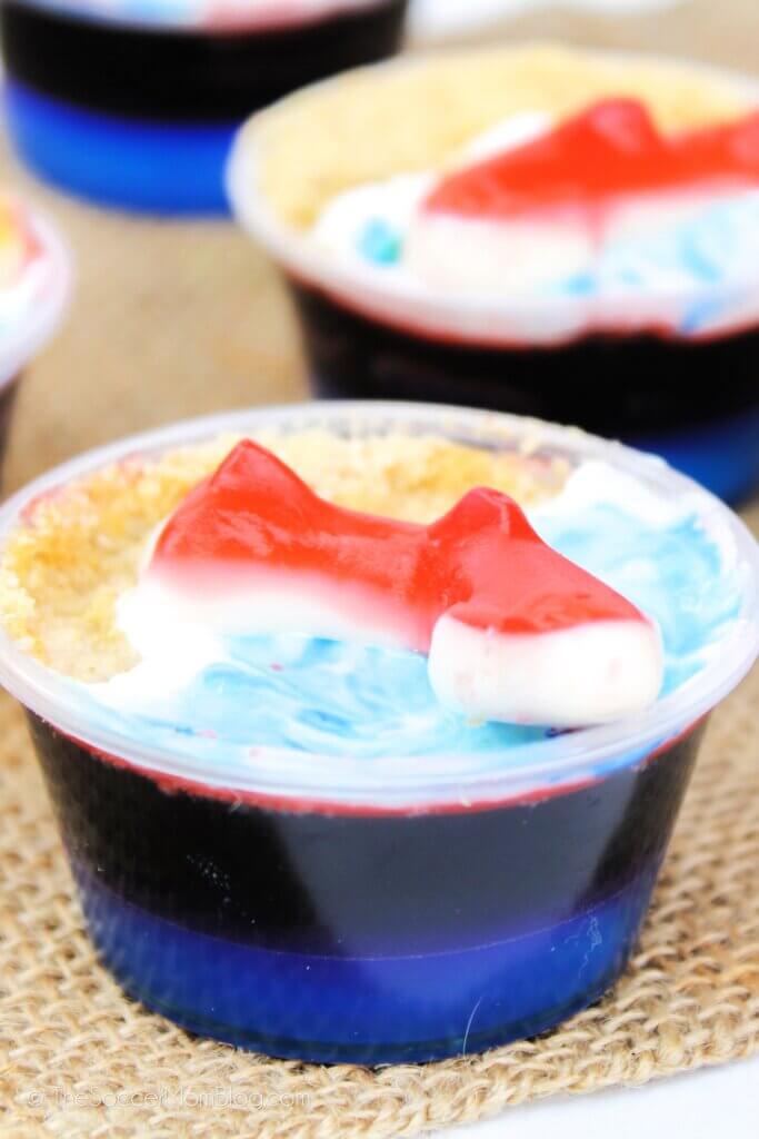 close up of a shark jello shot with gummy shark on top
