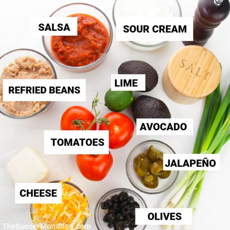 ingredients to make 7 layer bean dip, with labels
